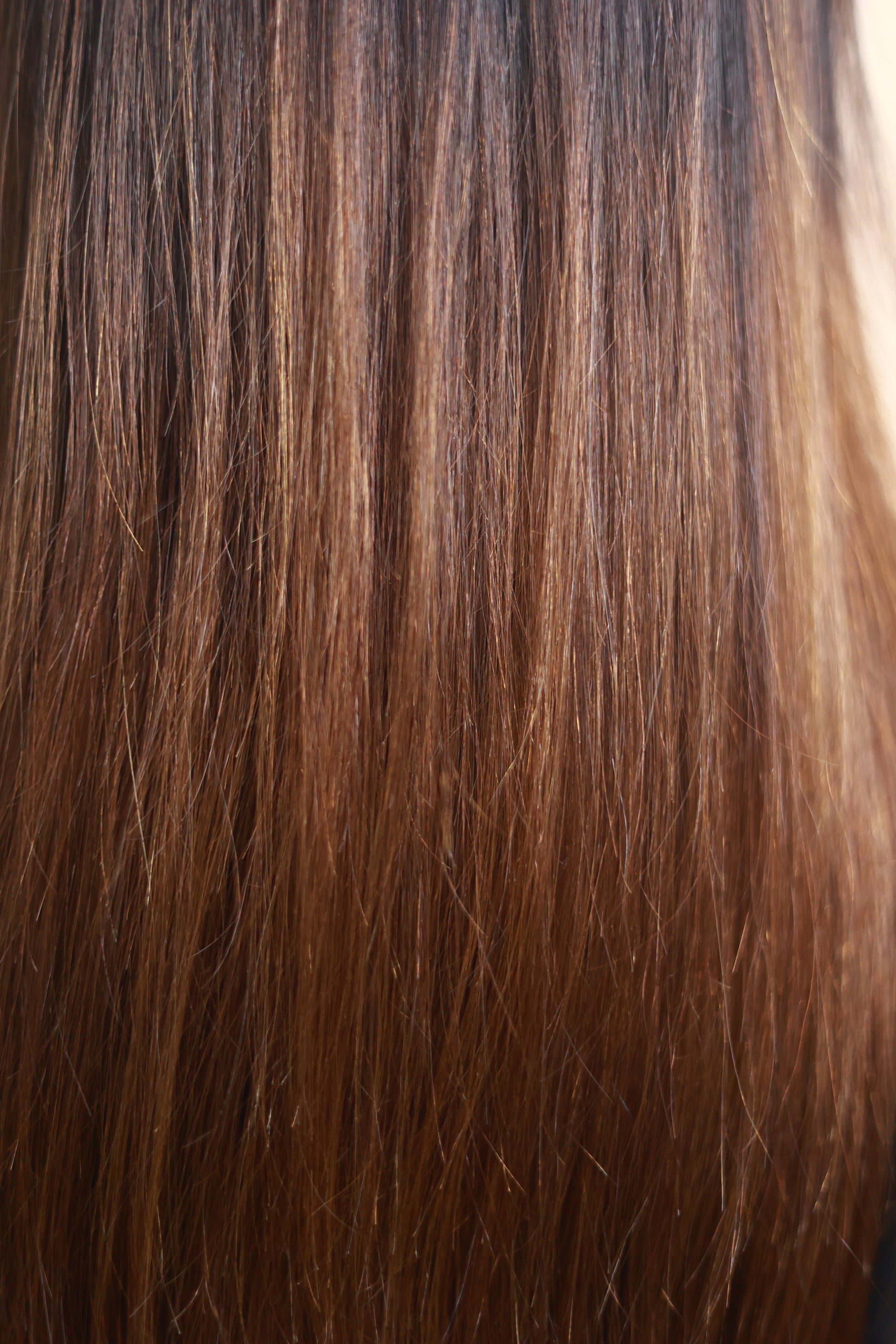 Model wearing HAZEL straight chocolate brown human hair wig with HD lace, glueless and clipless design, free parting, and breathable construction for all-day comfort; also great for medical use